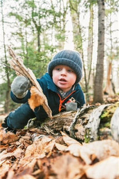 image of a child in woods