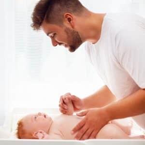 father/carer caring for a baby